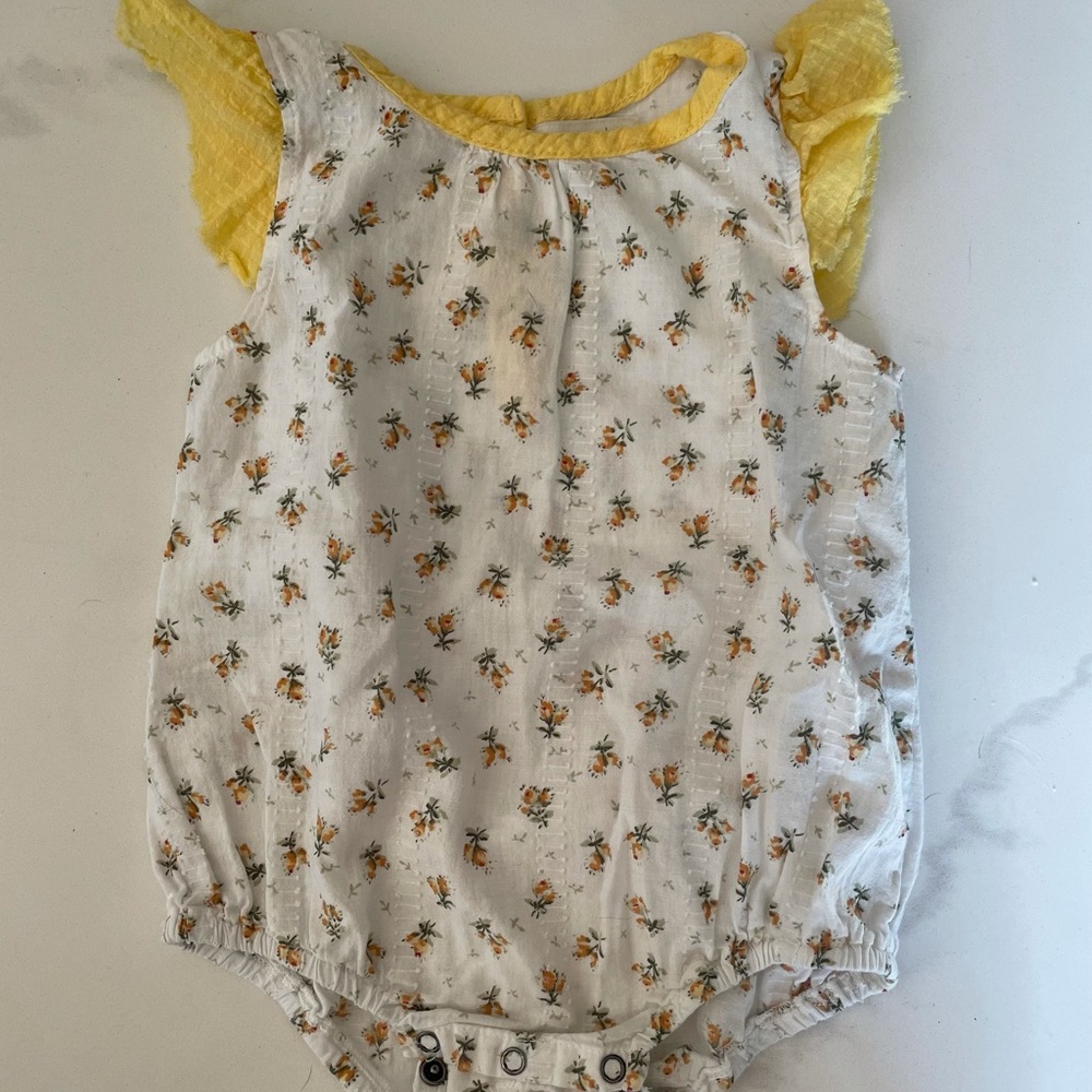 Delicate yellow floral romper